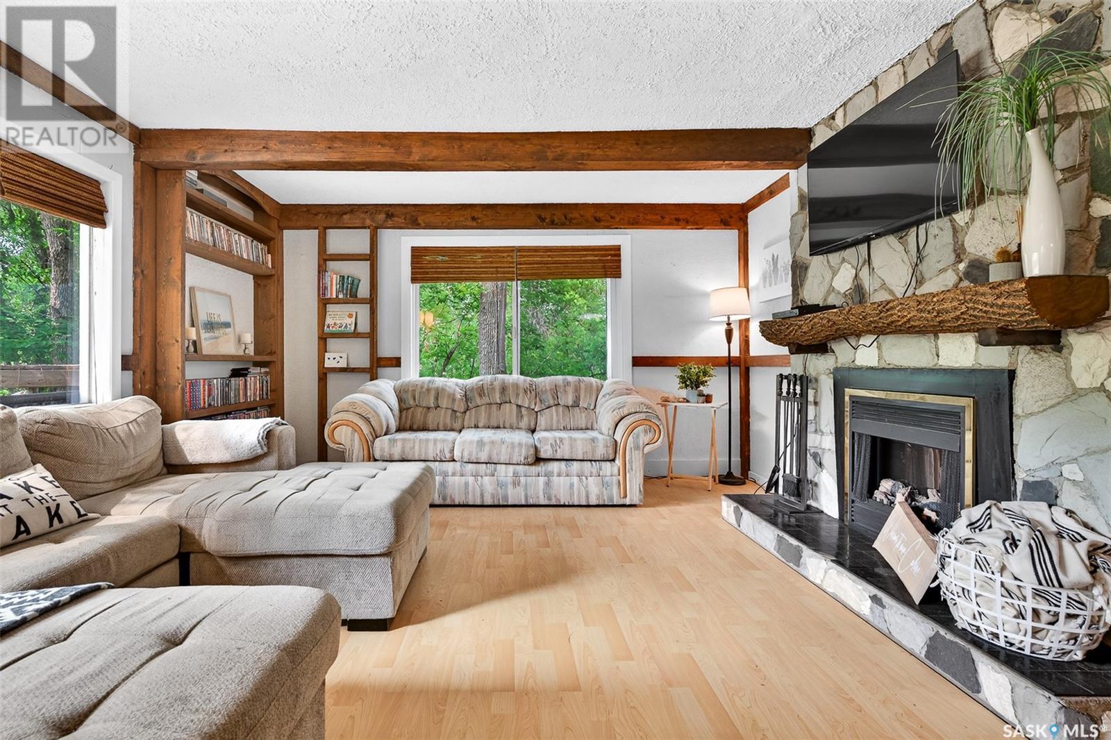 3 Elliott Drive, Sun Valley, SK - Indoor Photo Showing Living Room With Fireplace
