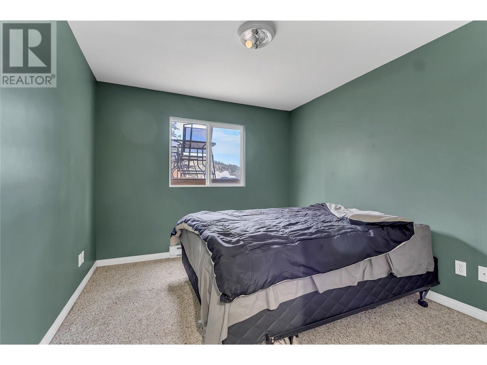3803 Mclean Creek Road, Okanagan Falls, BC - Indoor Photo Showing Bedroom