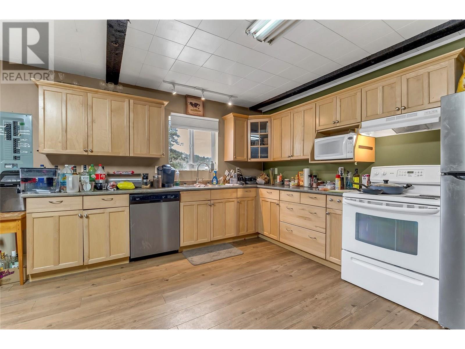 3803 Mclean Creek Road, Okanagan Falls, BC - Indoor Photo Showing Kitchen With Double Sink