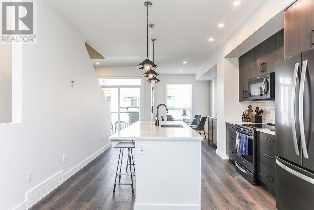 Staged - 610 Academy Way Unit# 363, Kelowna, BC - Indoor Photo Showing Kitchen With Upgraded Kitchen