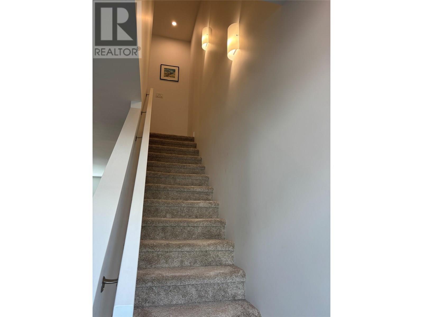 Stairs to 3rd Level - 610 Academy Way Unit# 363, Kelowna, BC - Indoor Photo Showing Other Room