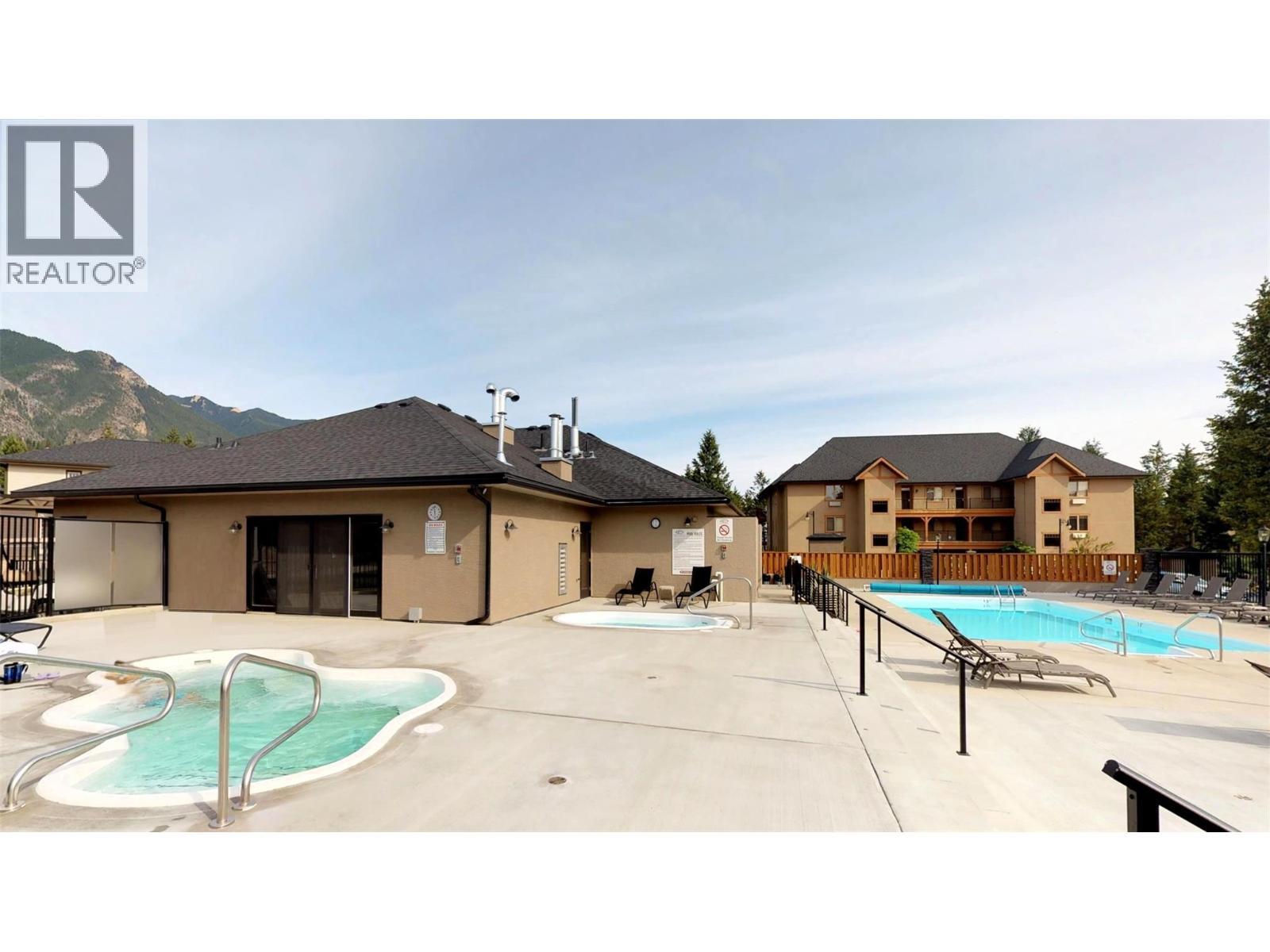 800 Bighorn Boulevard Unit# 825 E, Radium Hot Springs, BC - Outdoor With In Ground Pool