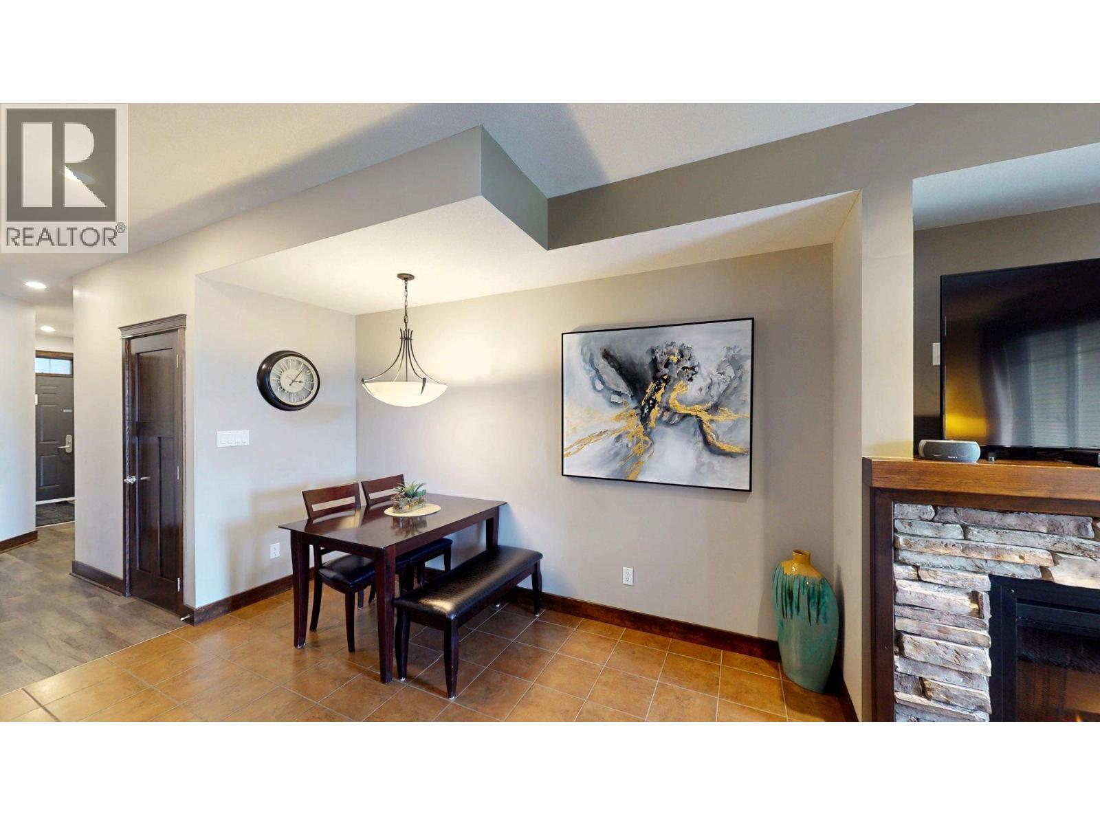 800 Bighorn Boulevard Unit# 825 E, Radium Hot Springs, BC - Indoor With Fireplace