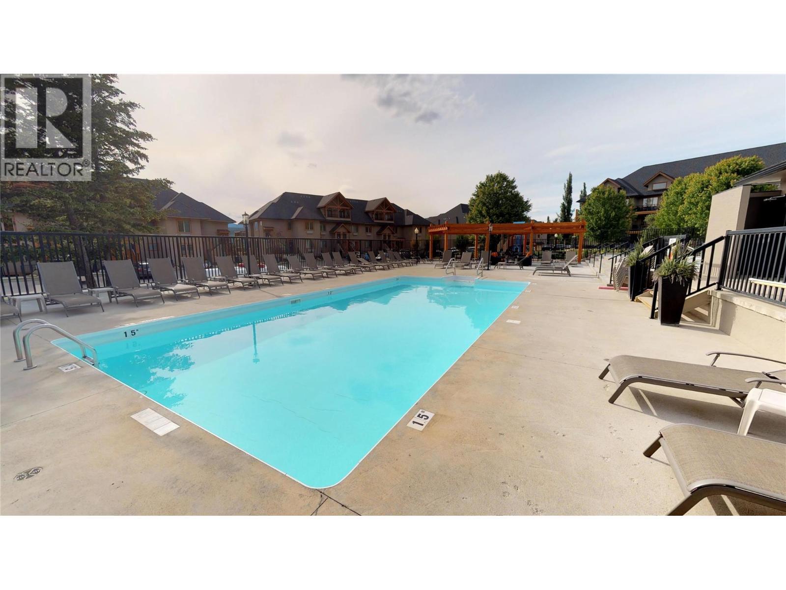 800 Bighorn Boulevard Unit# 825 E, Radium Hot Springs, BC - Outdoor With In Ground Pool