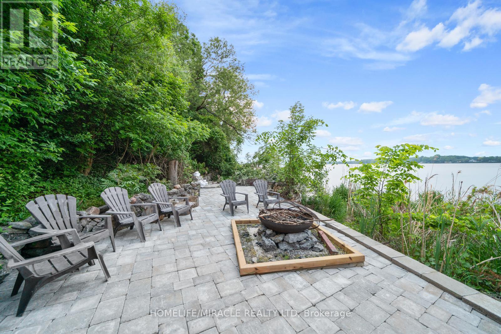 11278 Loyalist Parkway, Prince Edward County, ON - Outdoor With Body Of Water With Deck Patio Veranda