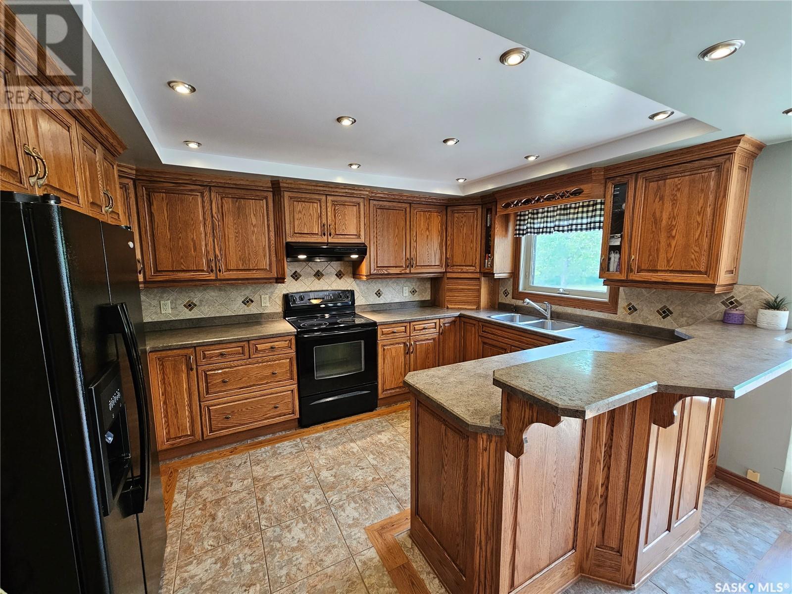 206 West 1St Street, Alida, SK - Indoor Photo Showing Kitchen With Double Sink