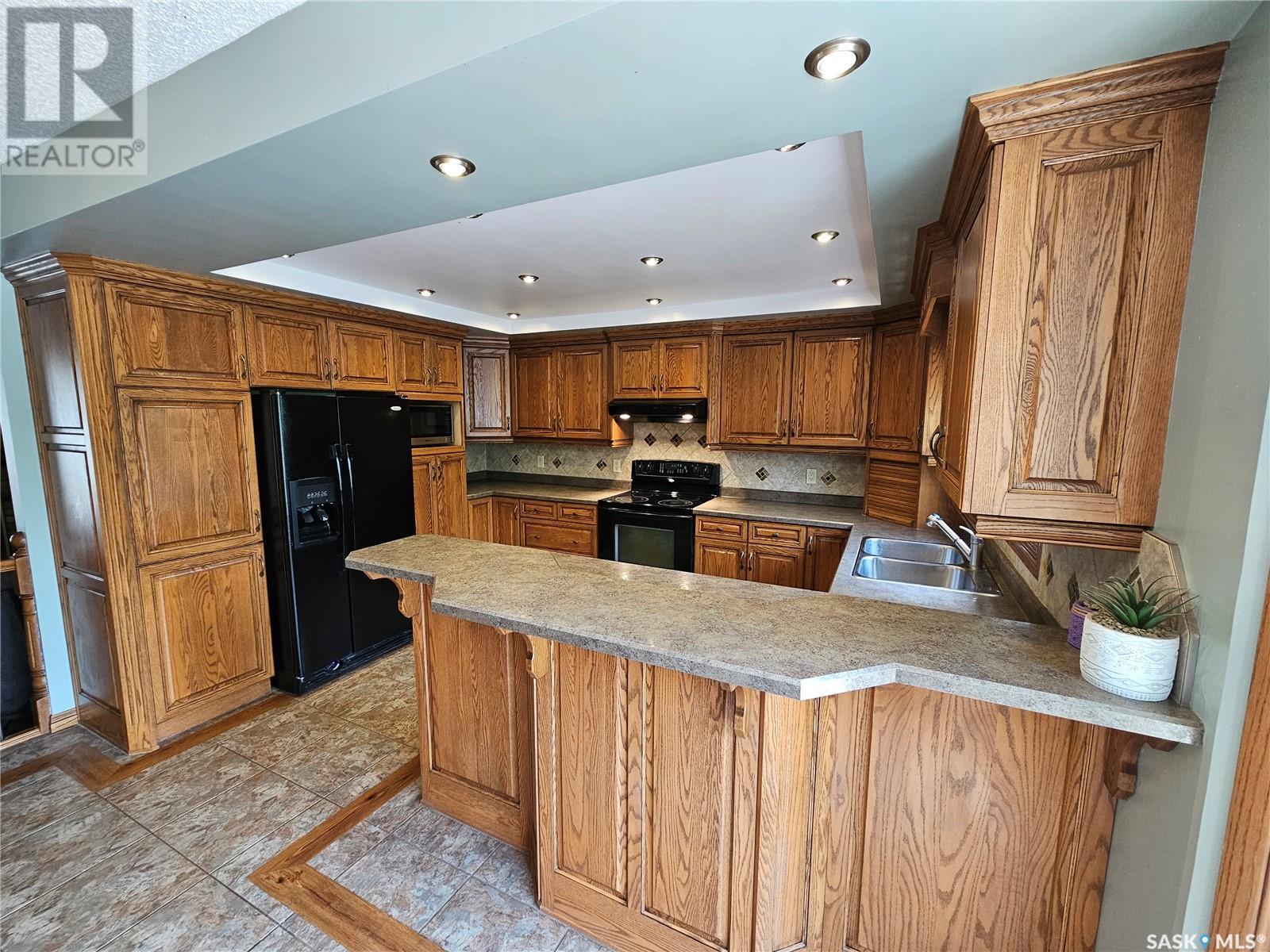 206 West 1St Street, Alida, SK - Indoor Photo Showing Kitchen With Double Sink