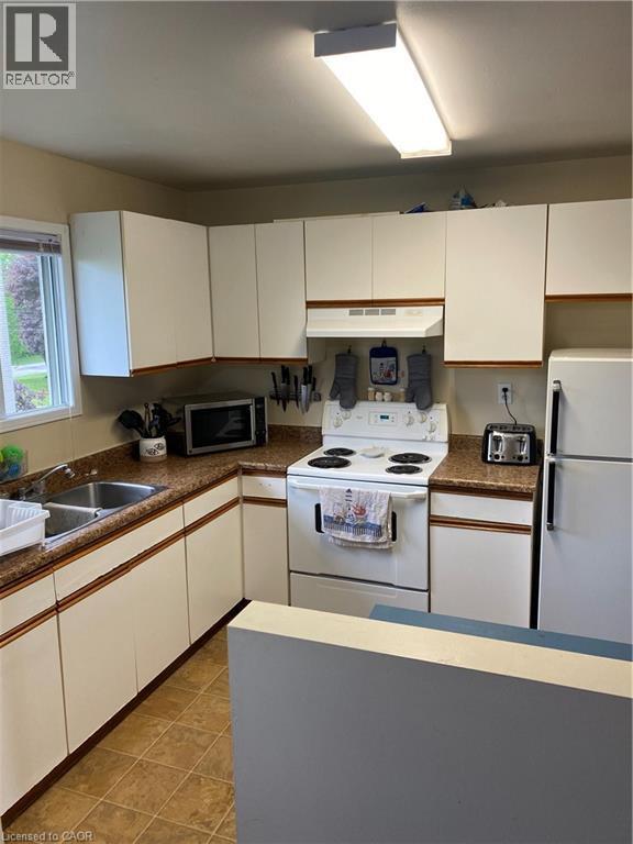 Unit 2 - 839 Stirling Avenue S, Kitchener, ON - Indoor Photo Showing Kitchen With Double Sink