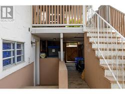 Back door entry to downstairs, and extra storage -