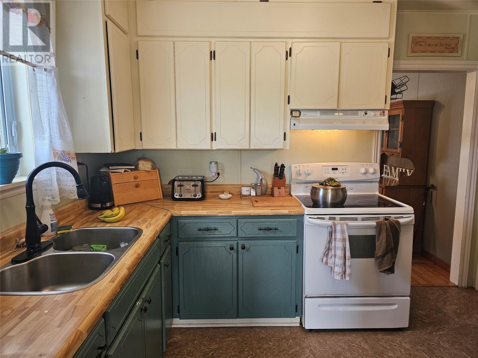 2 First Avenue, Channel-Port Aux Basques, NL - Indoor Photo Showing Kitchen With Double Sink
