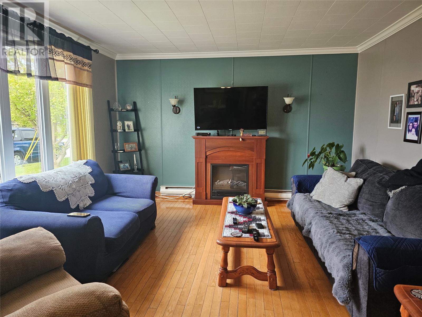 2 First Avenue, Channel-Port Aux Basques, NL - Indoor Photo Showing Living Room With Fireplace