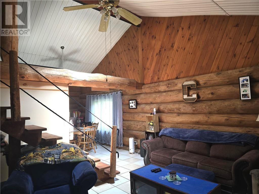 252 Pothier, St. Charles, ON - Indoor Photo Showing Living Room