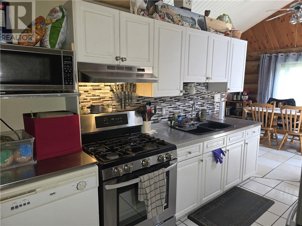 252 Pothier, St. Charles, ON - Indoor Photo Showing Kitchen With Double Sink
