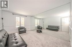 Living area featuring carpet flooring -