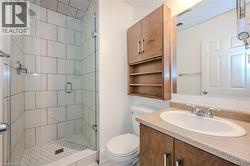 Full bathroom featuring a stall shower and vanity -