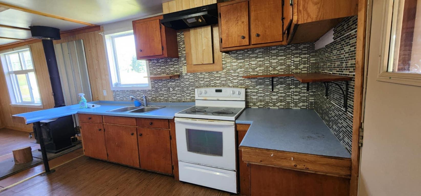 48 Puckett Road, Cherryville, BC - Indoor Photo Showing Kitchen With Double Sink