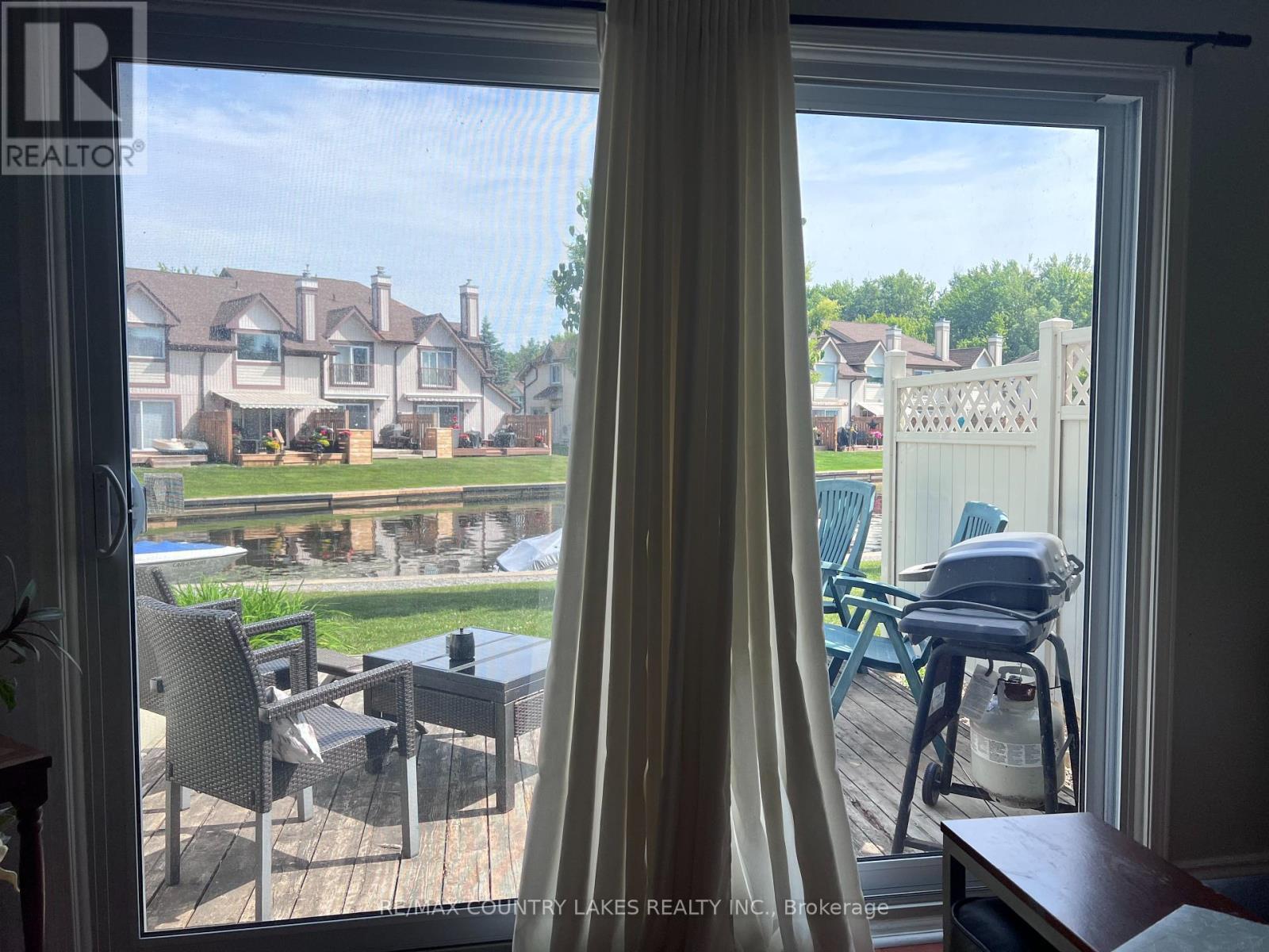 Outdoor View - 4 - 11 Laguna Parkway, Ramara, ON - Indoor Photo Showing Other Room