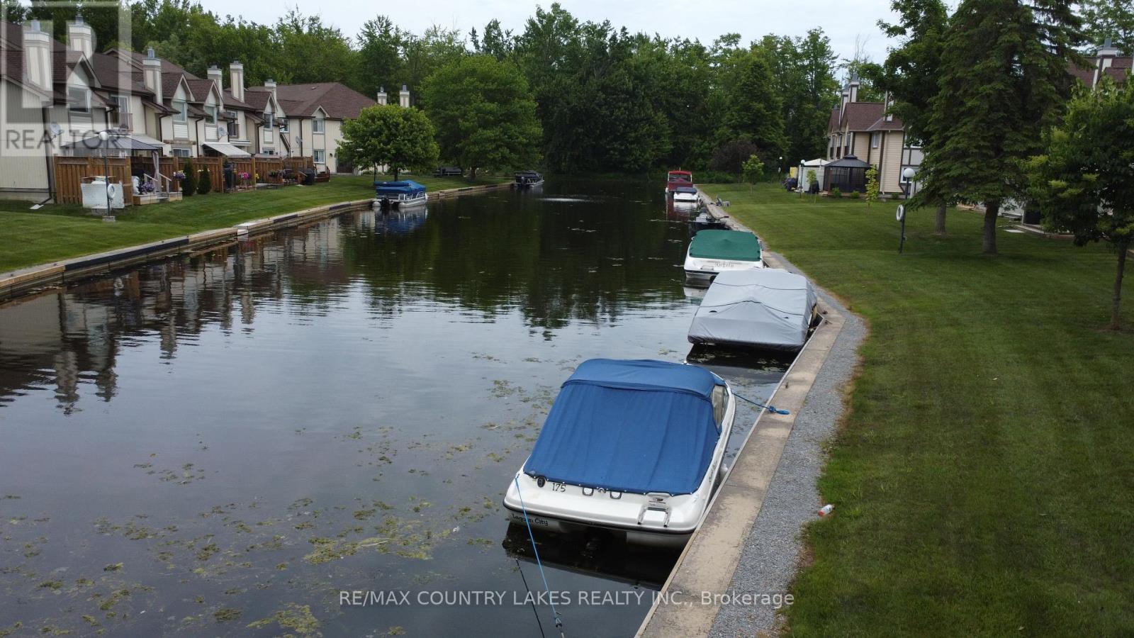 Canal View - 4 - 11 Laguna Parkway, Ramara, ON - Outdoor With Body Of Water