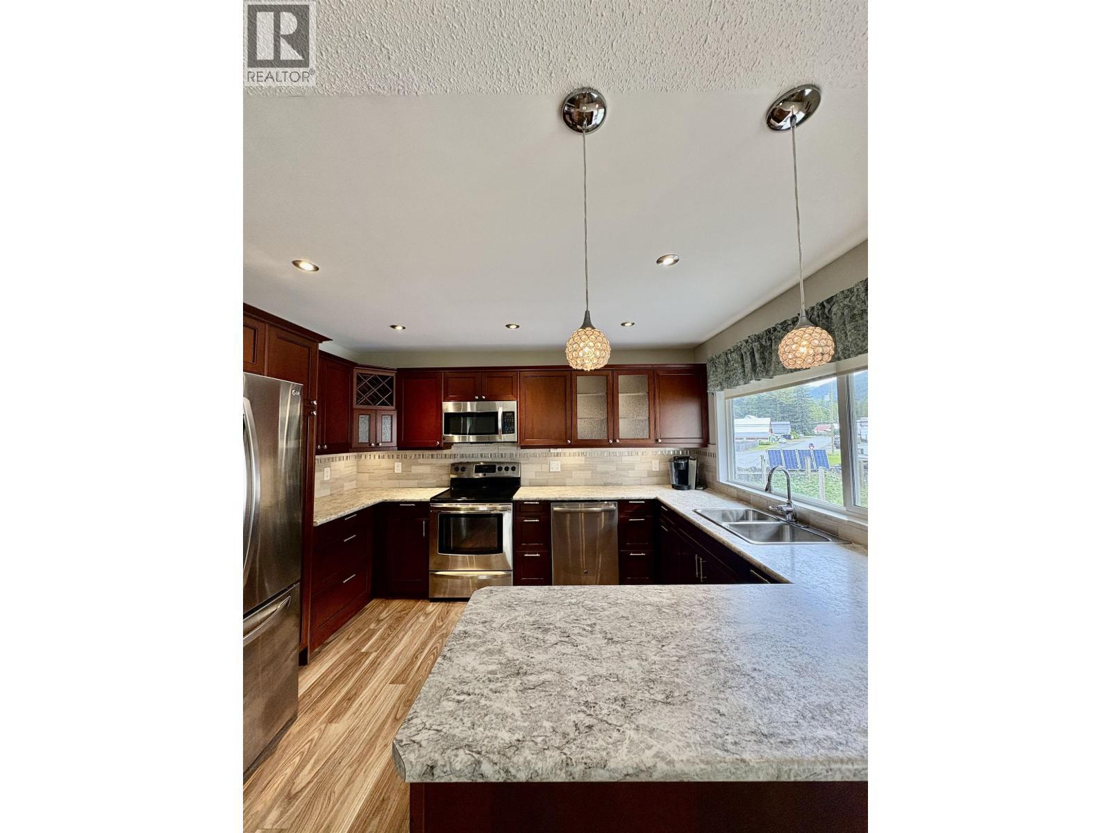 1407 Raven Street, Stewart, BC - Indoor Photo Showing Kitchen With Double Sink With Upgraded Kitchen