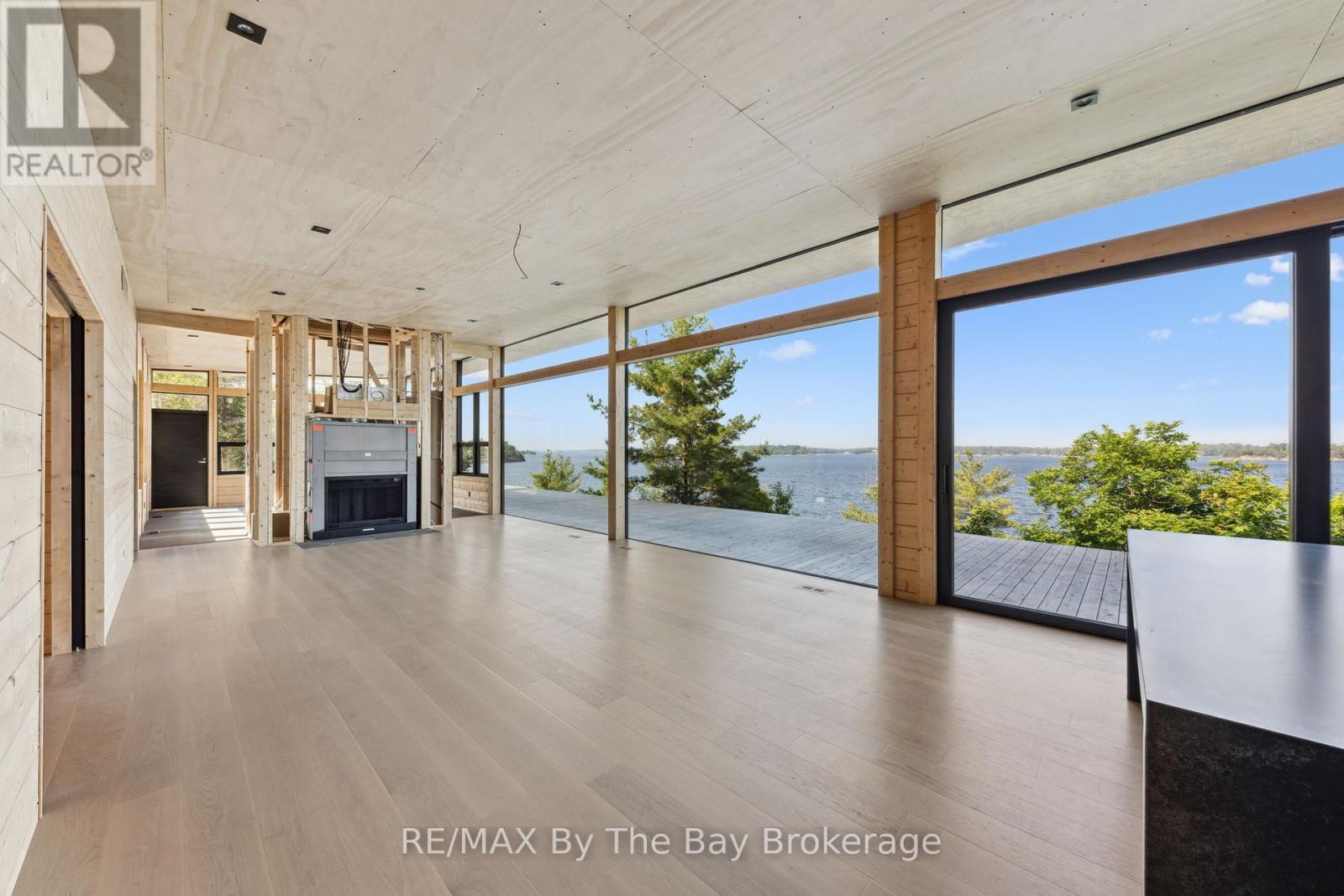 11324 Island 1810/Bone Island, Georgian Bay (Gibson), ON - Indoor Photo Showing Living Room With Fireplace