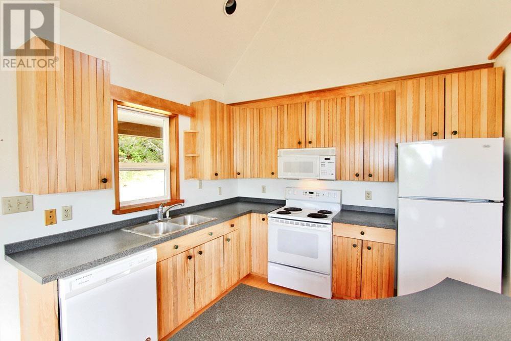 209 2Nd Avenue, Daajing Giids City, BC - Indoor Photo Showing Kitchen With Double Sink