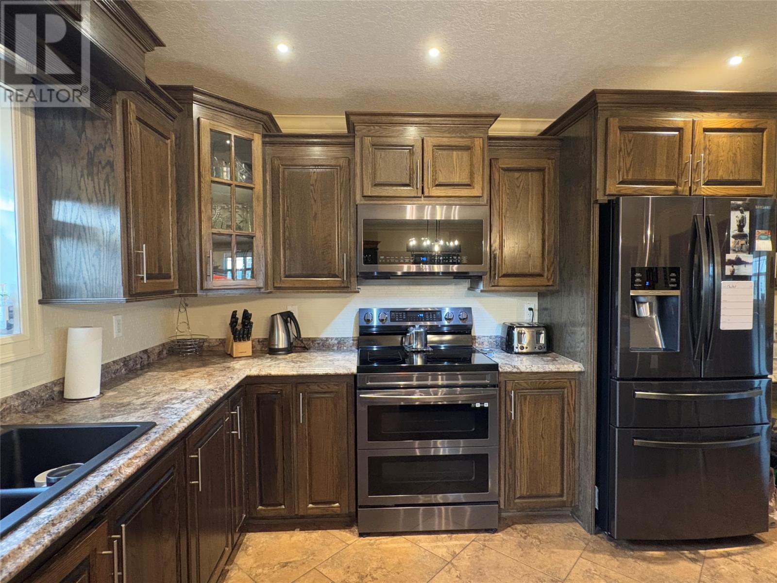 18 Mccarthy’S Lane, Kippens, NL - Indoor Photo Showing Kitchen With Double Sink