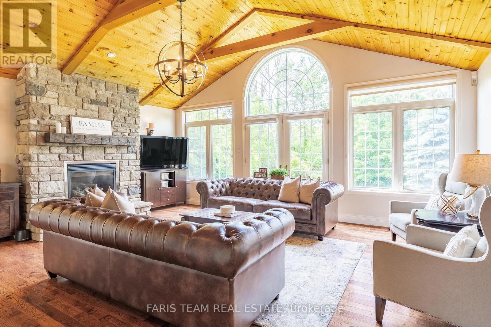 9229 25 Sideroad Adjala, Adjala-Tosorontio, ON - Indoor Photo Showing Living Room With Fireplace