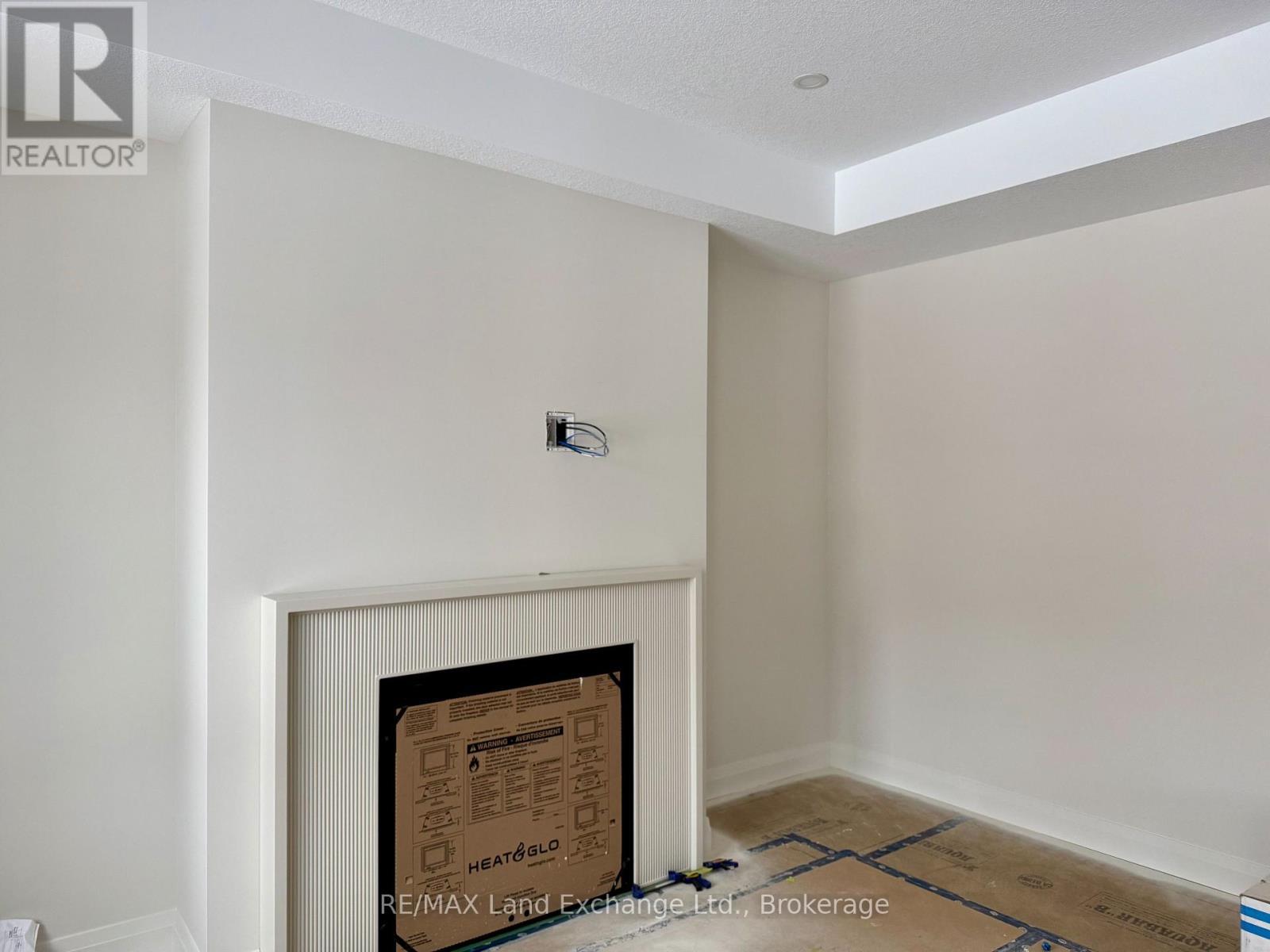 964 Bogdanovic Way, Huron-Kinloss, ON - Indoor Photo Showing Other Room With Fireplace