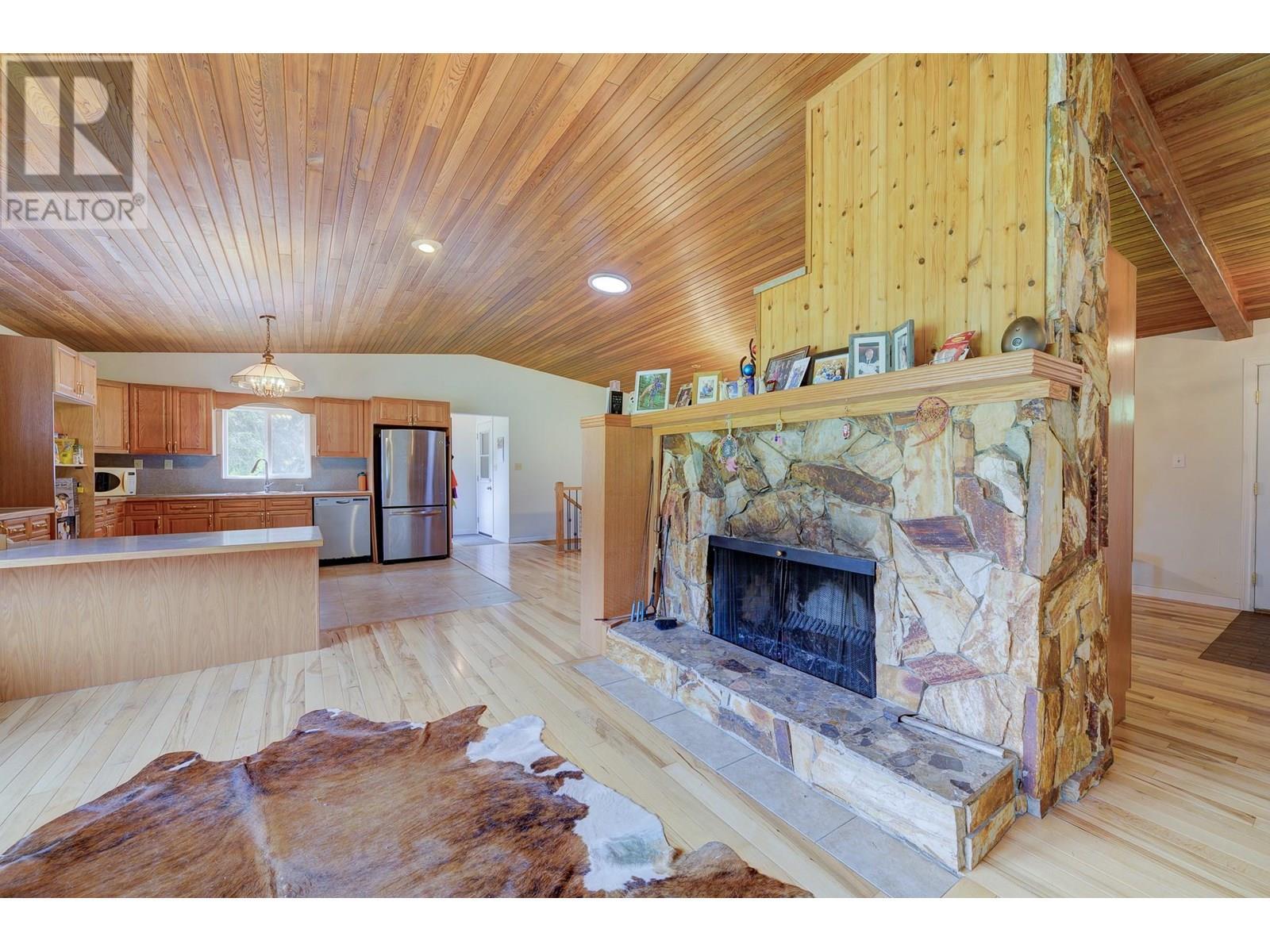 1053 Ptarmigan Road, Chase, BC - Indoor Photo Showing Living Room With Fireplace