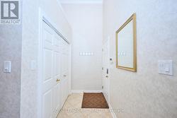 Garage access and double closet off the front door -