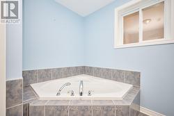 4pc bath lower level corner jacuzzi tub -