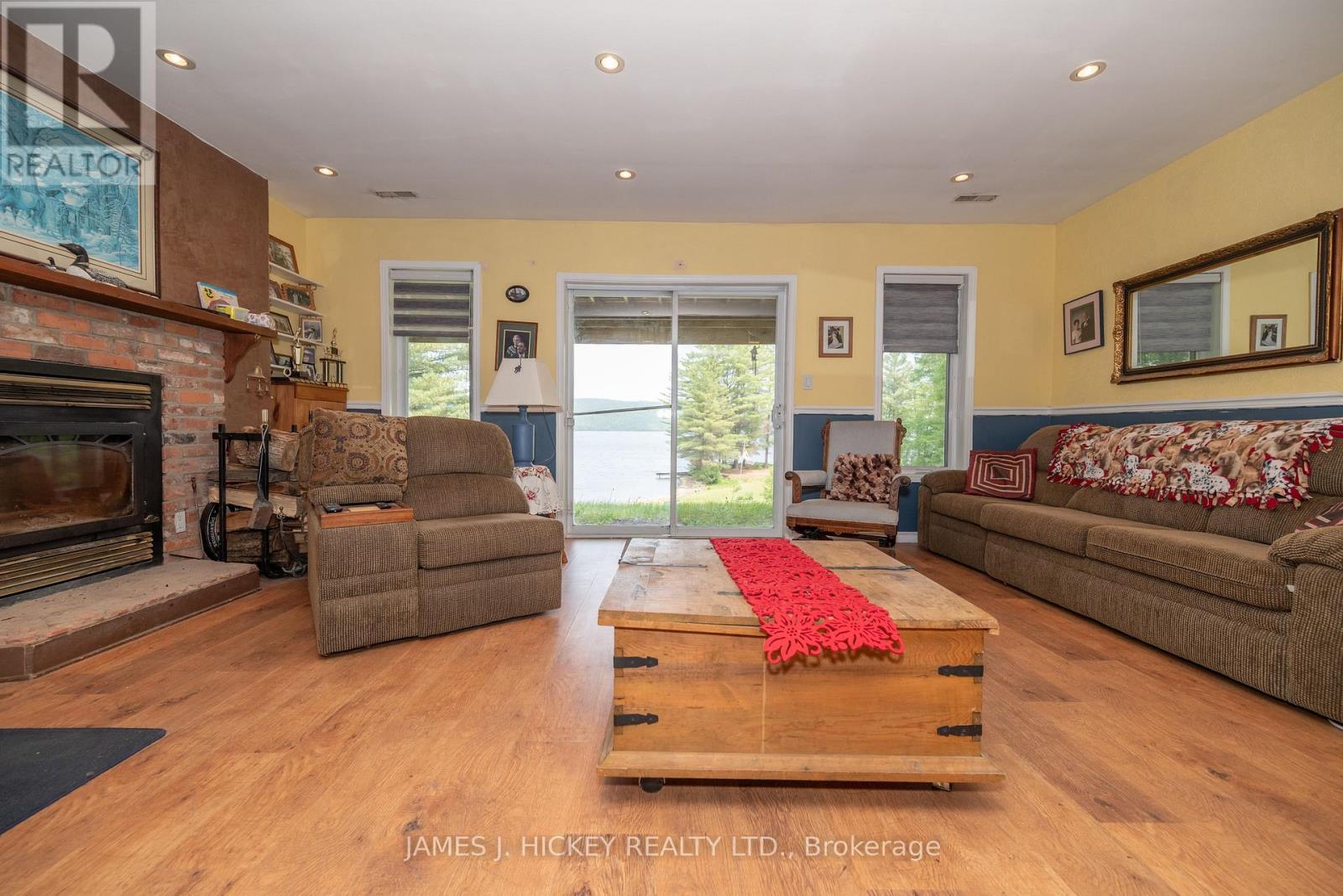 196 Loon Valley Lane, Head, Clara And Maria, ON - Indoor Photo Showing Living Room With Fireplace