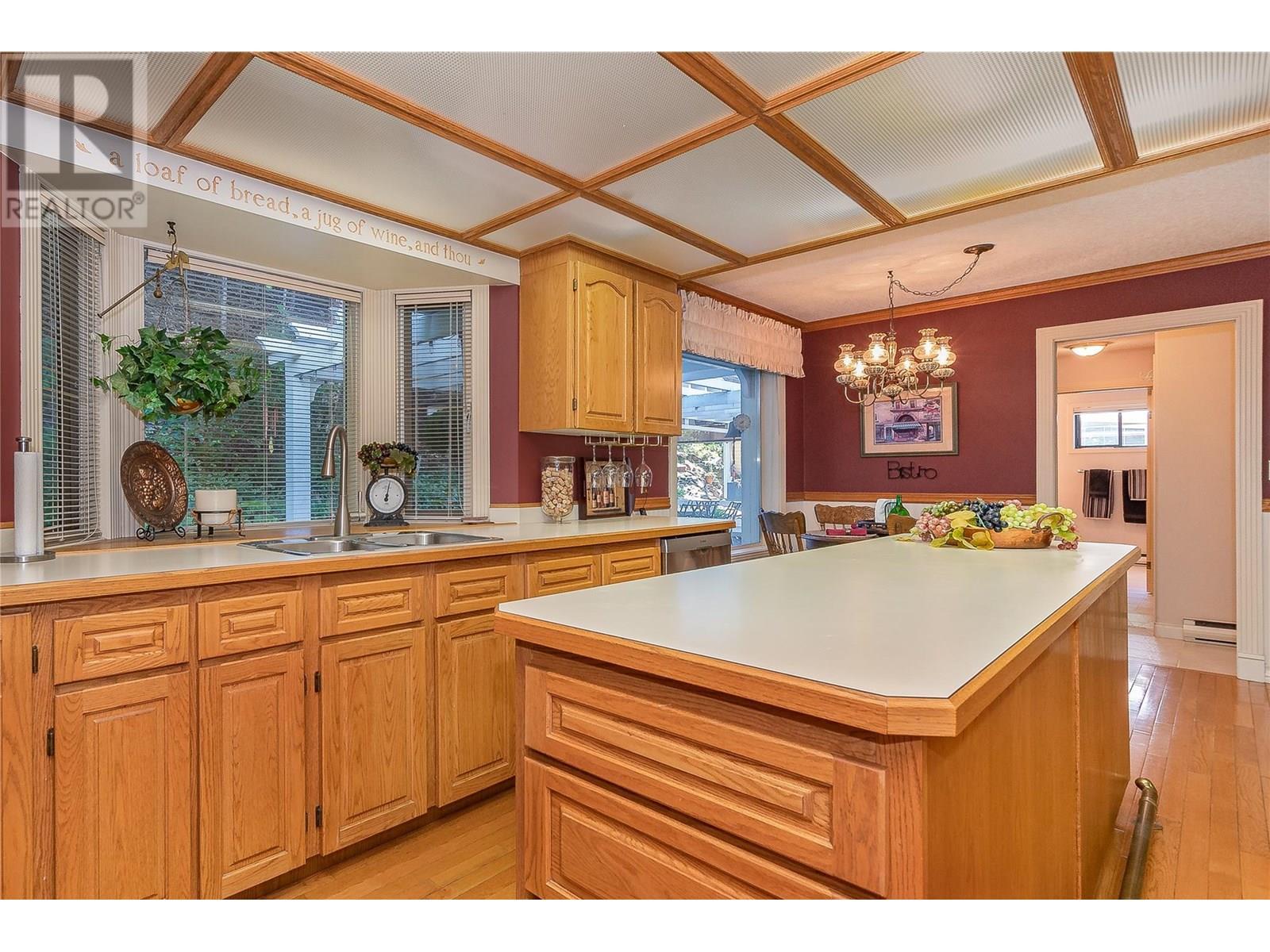 9178 Clancy Frontage Road, Mara, BC - Indoor Photo Showing Kitchen With Double Sink