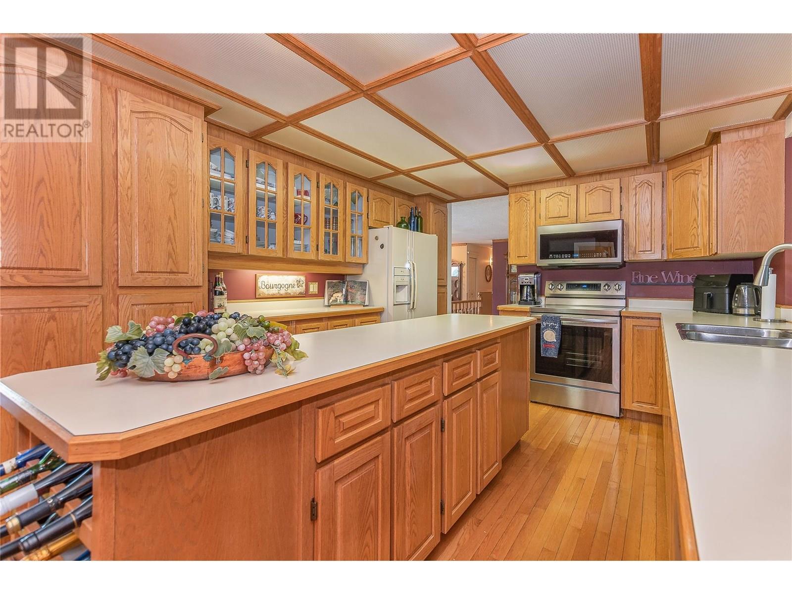9178 Clancy Frontage Road, Mara, BC - Indoor Photo Showing Kitchen With Double Sink
