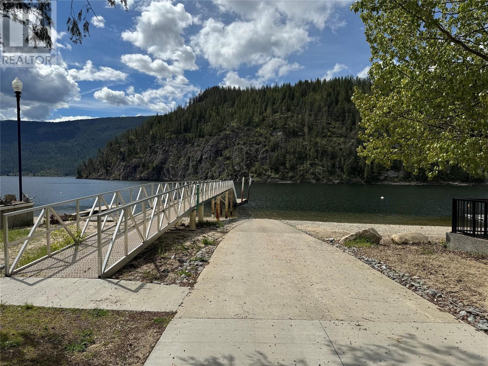 Swansea point point launch - 9178 Clancy Frontage Road, Mara, BC - Outdoor With View