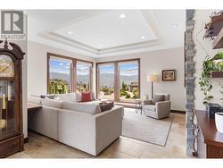 Linear Gas Fireplace, Built in Cabinets, Floating Shelves, Coffered Ceiling, Large Windows, View -