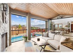 View to pool from covered outdoor living space -