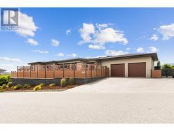 Side garage with entrance into main/top floor for easy living. -