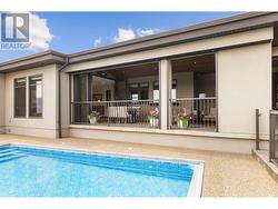 Pool view into outdoor entertaining area. -