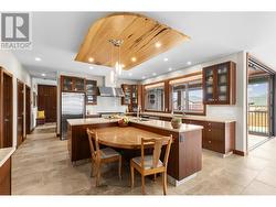 Live edge breakfast bar and live edge ceiling feature -