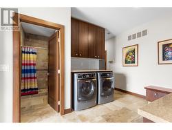 Pool shower in friends and family entrance with access to pool and garage. -