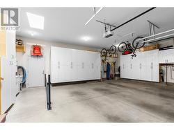 Oversized garage with skylights, pool equipment and great storage -