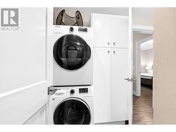 1 bedroom legal suite laundry with storage closet behind. -