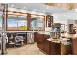 In cabinet appliance lift and magic corner for great storage -