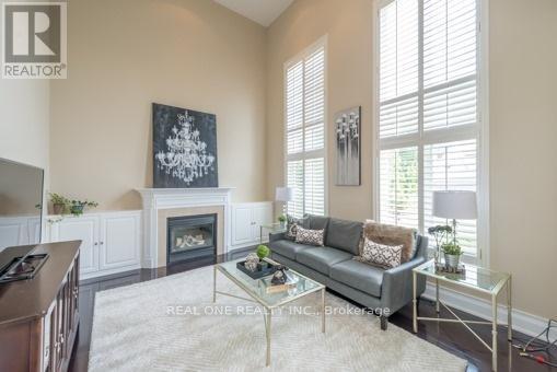 63 The Fairways, Markham, ON - Indoor Photo Showing Living Room With Fireplace