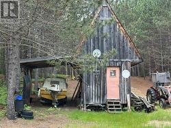 Storage Shed with Lean-To -