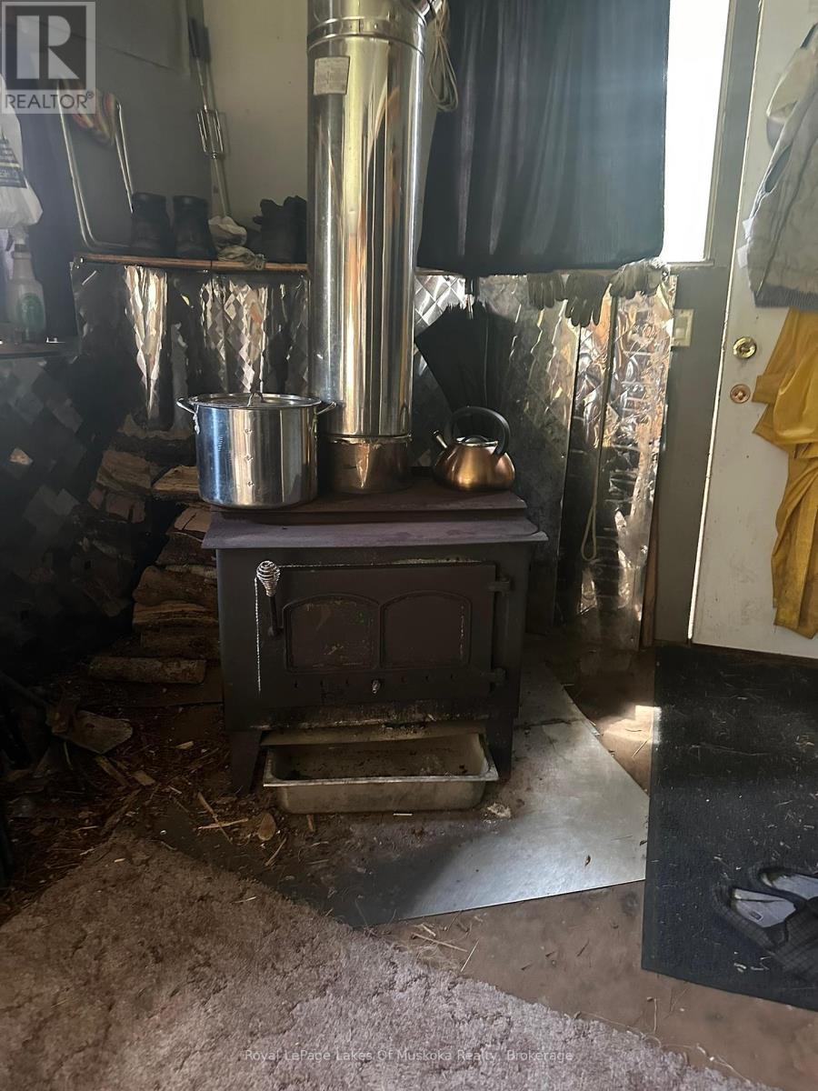 Woodstove for Warmth - 1958 518 Highway, Mcmurrich/Monteith (Sprucedale), ON - Photo Showing Other Room