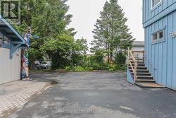 Rear parking for 3 cars -