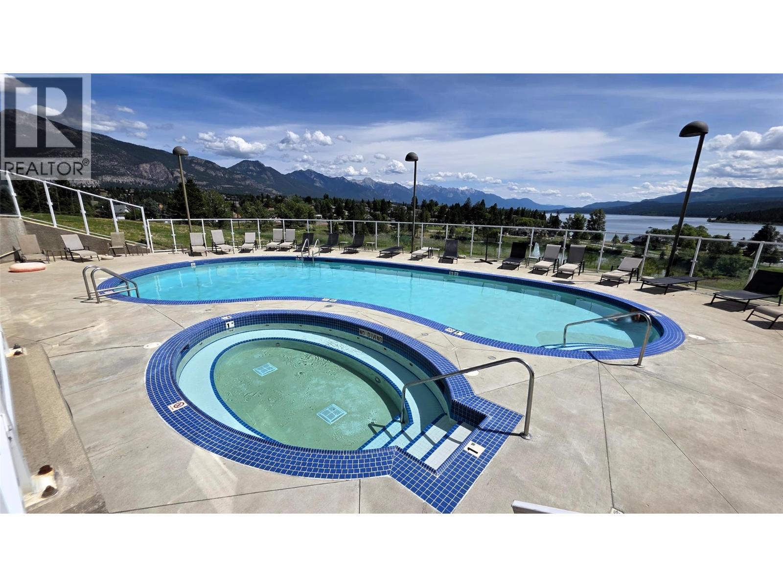 701 14A Crescent Unit# 213 I, Invermere, BC - Outdoor With In Ground Pool With View