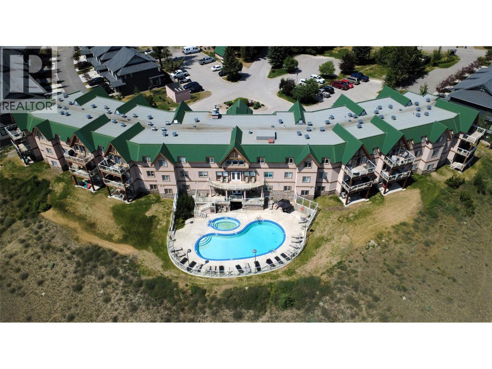 701 14A Crescent Unit# 213 I, Invermere, BC - Outdoor With In Ground Pool With View